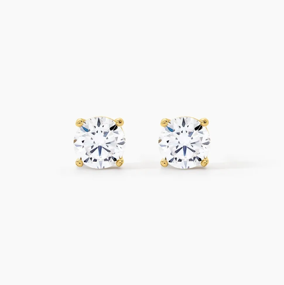 Boucles D'oreilles Puces Phebus Him Acier Doré Oxyde De Zirconium